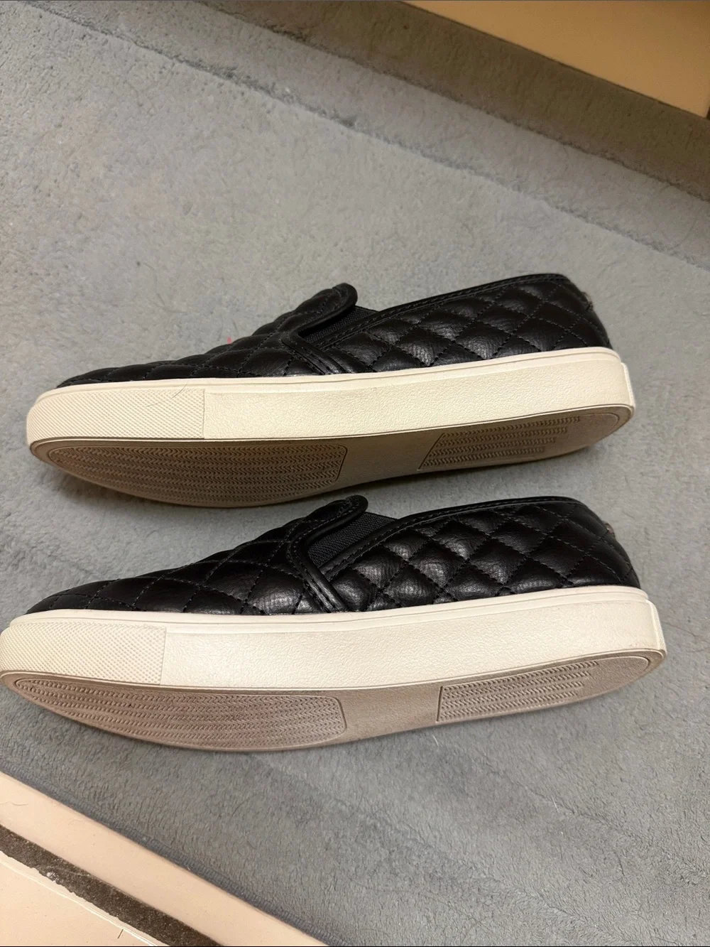 Steve Madden Black Quilted Slip-On Sneakers with White Sole